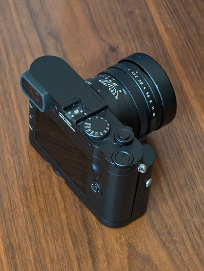 Leica Q2 Monochrom with grip, filters, SD Card