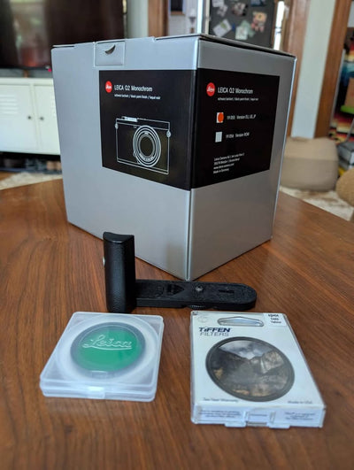 Leica Q2 Monochrom with grip, filters, SD Card