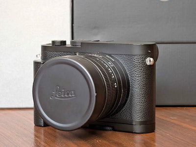 Leica Q2 Monochrom with grip, filters, SD Card