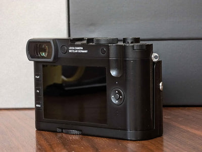 Leica Q2 Monochrom with grip, filters, SD Card